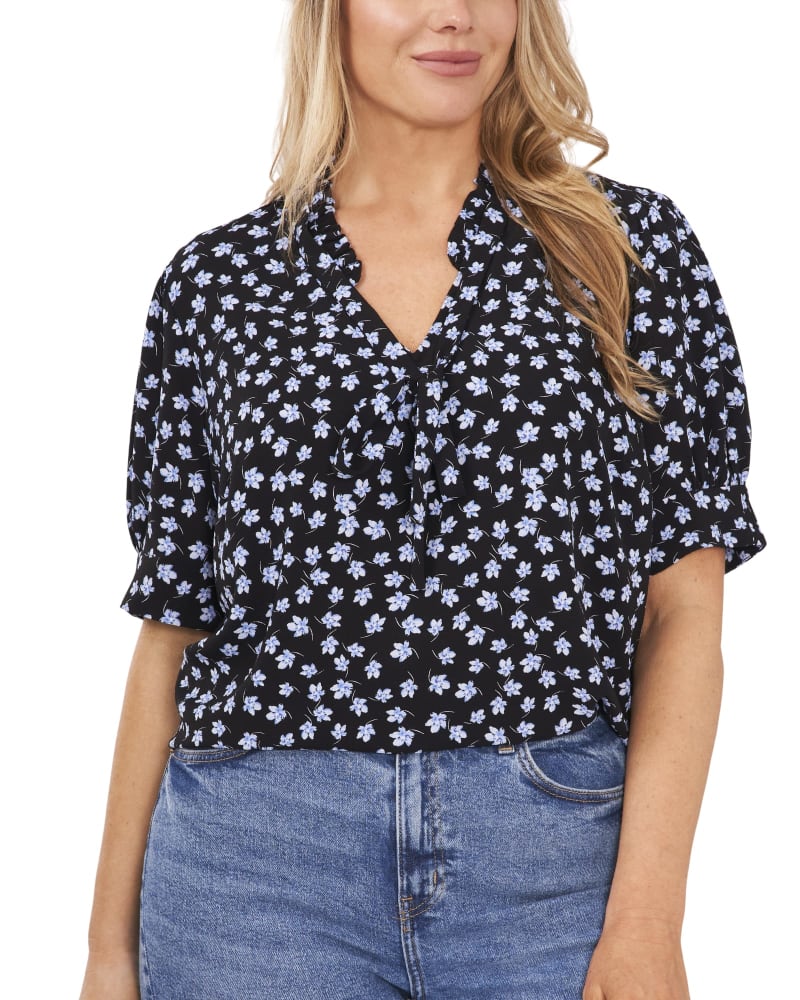 Front of a model wearing a size 0X Petra Frilly V-Neck Blouse in BROOKEDITSYRB by CeCe. | dia_product_style_image_id:263786